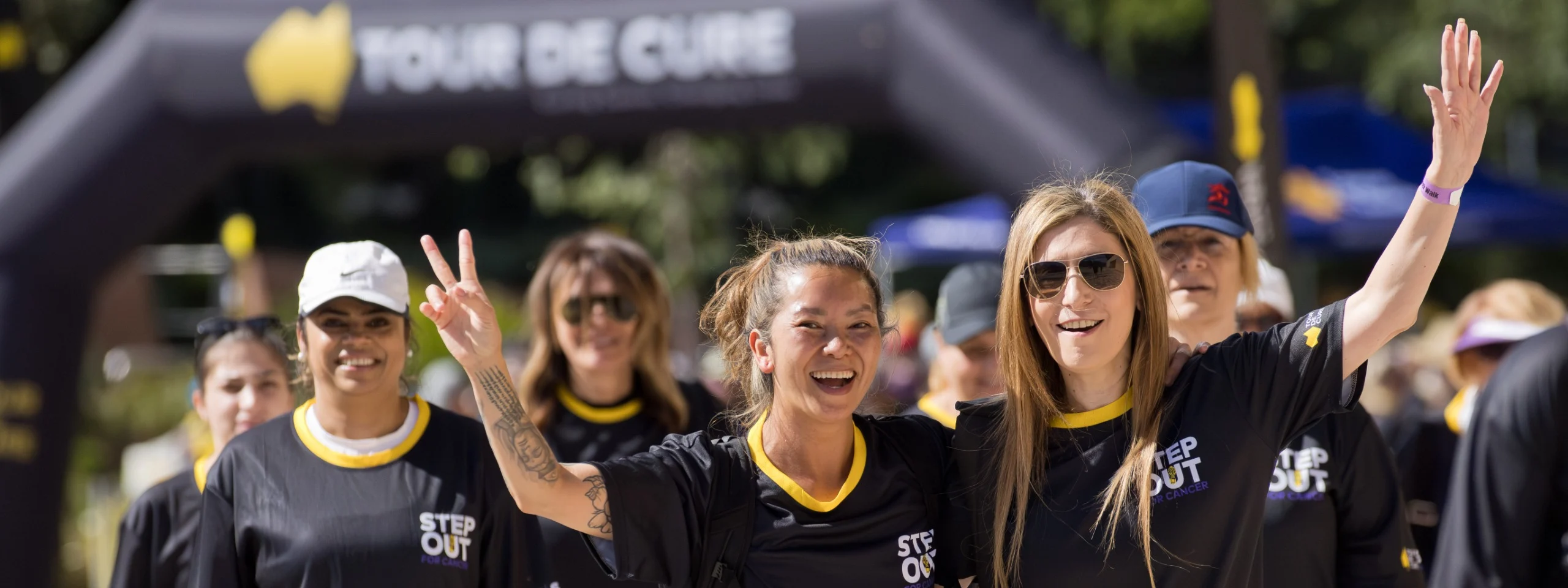 Step Out for Cancer event artwork showing participants at Sydney sporting venues.